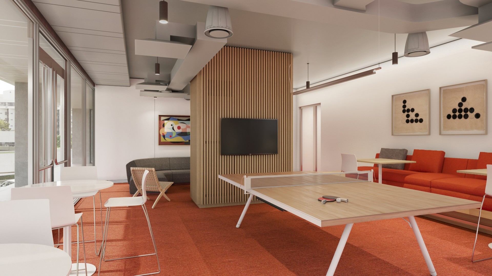 A rendering of a gameroom at 600 W. 125th Street. A rendering of a gameroom at 600 W. 125th Street that has a table tennis board, a tv, chairs, and a sofa.