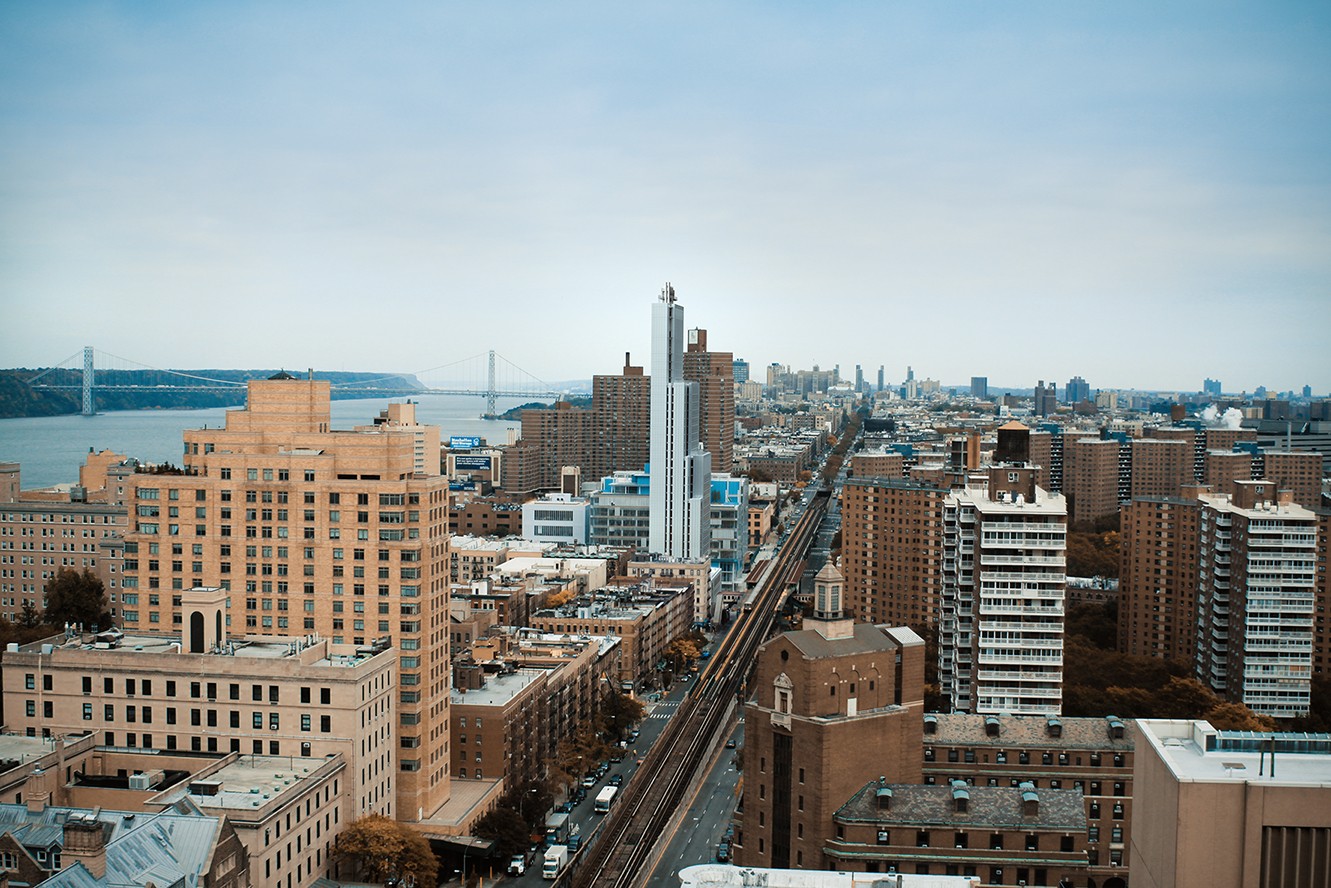 Aerial view of Manhattanville and 600 West 125th Street, facing North with the George Washington Bridge in the distance