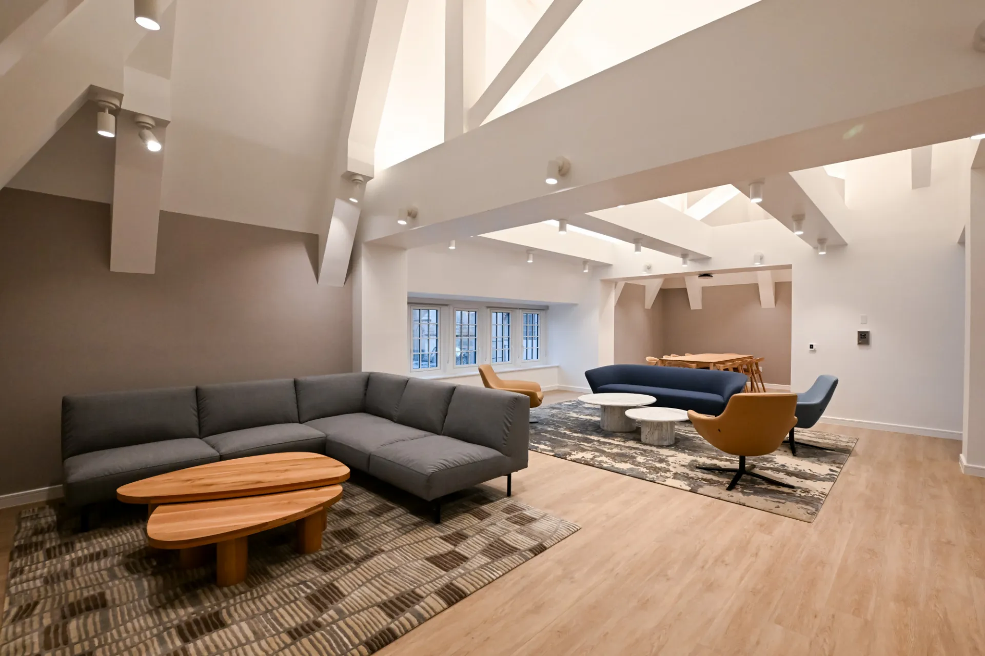 Lounge seating in 9th Floor Lounge, showing couches & chairs with skylight and ceiling beams. Credit: Diane Bondareff