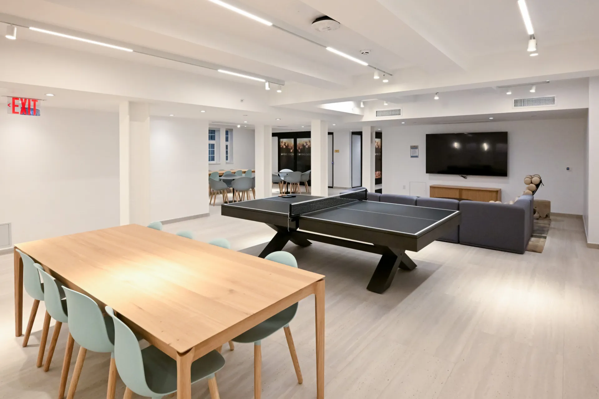 Photo of ground floor lounge showing seating and ping pong table. Credit: Diane Bondareff