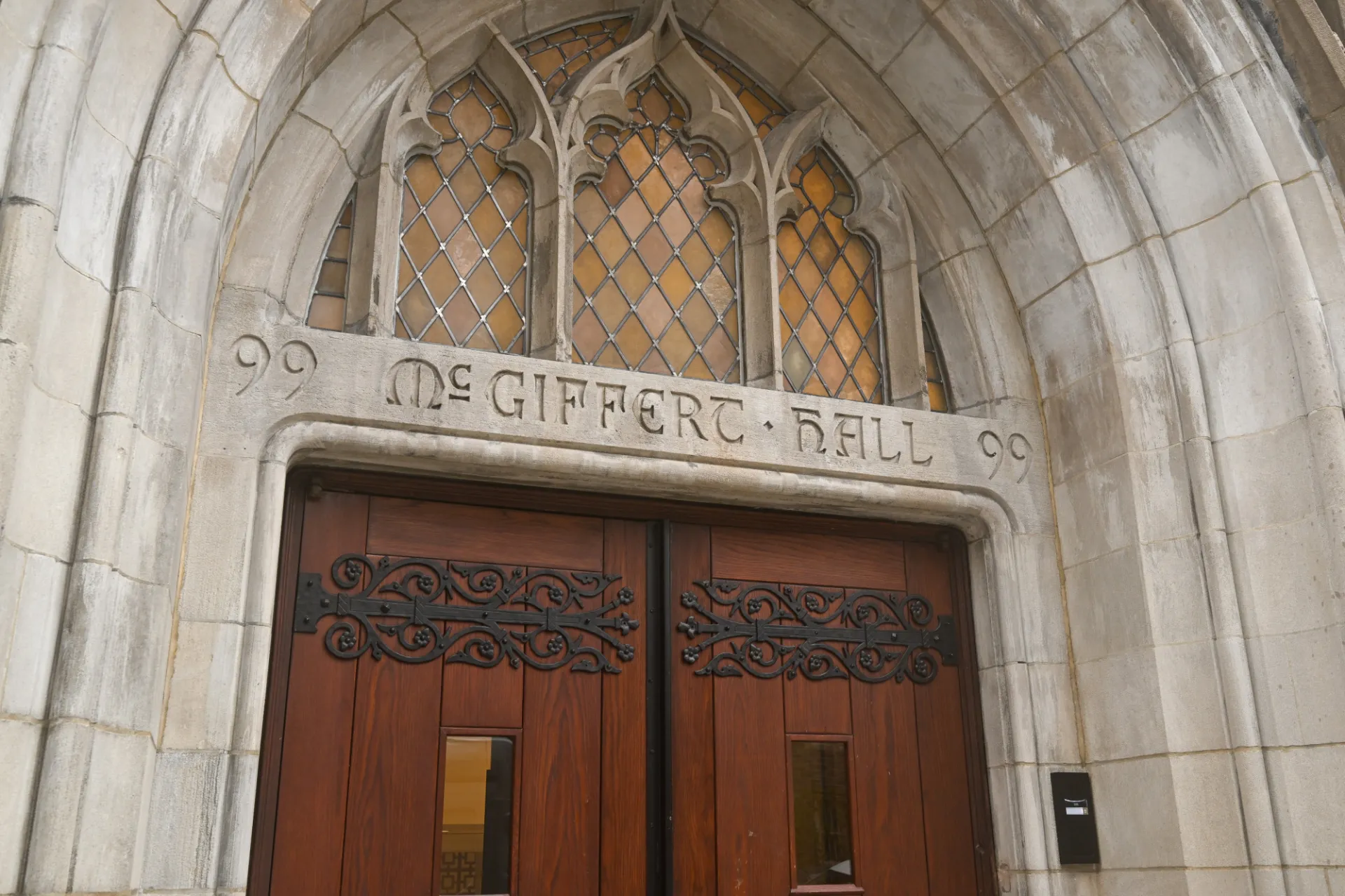 Entrance door at 99 Claremont with McGiffert Hall written above door. Photo by Diane Bondareff