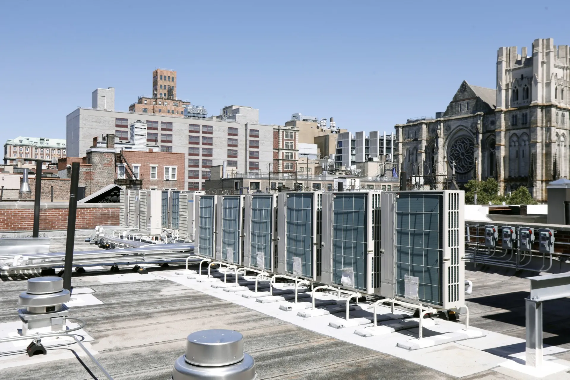 Equipment on the roof of 518 W. 111th Street with St. John the Divine in the background.